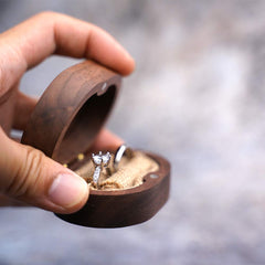 Mr & Mrs Walnut Wood Ring Box – held in hand showing open interior with two rings, lifestyle