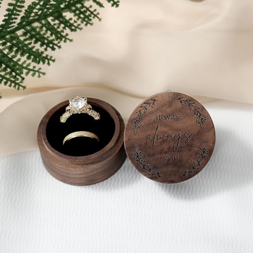 Oval Walnut Wood Ring Box – hands holding open box with diamond ring on lace fabric, wedding scene
