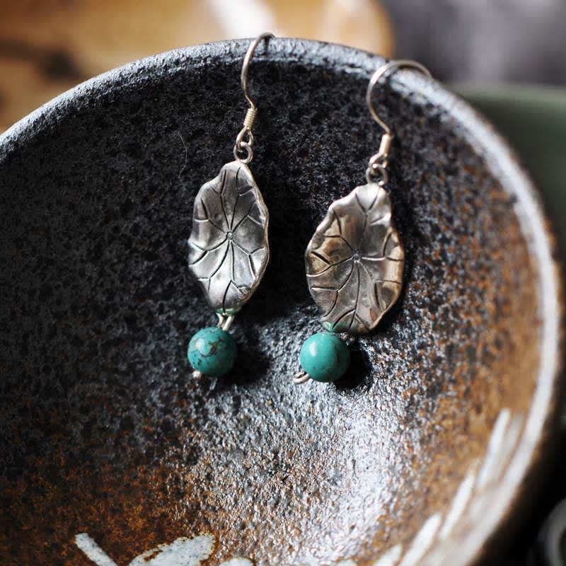 Sterling Silver Turquoise Lotus Leaf Earring - inside ceramic cup, turquoise detail