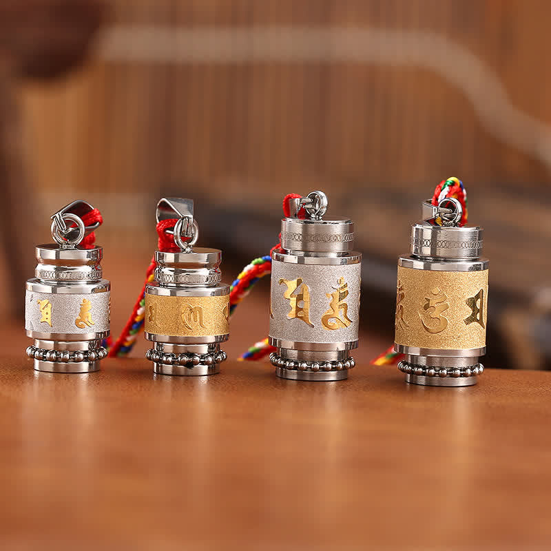 Om Mani Padme Hum Amulet – Four prayer wheels in two sizes, gold Tibetan script, titanium steel