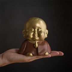Laughing Buddha Incense Burner – glazed ceramic rotund belly, aromatic meditation room accessory