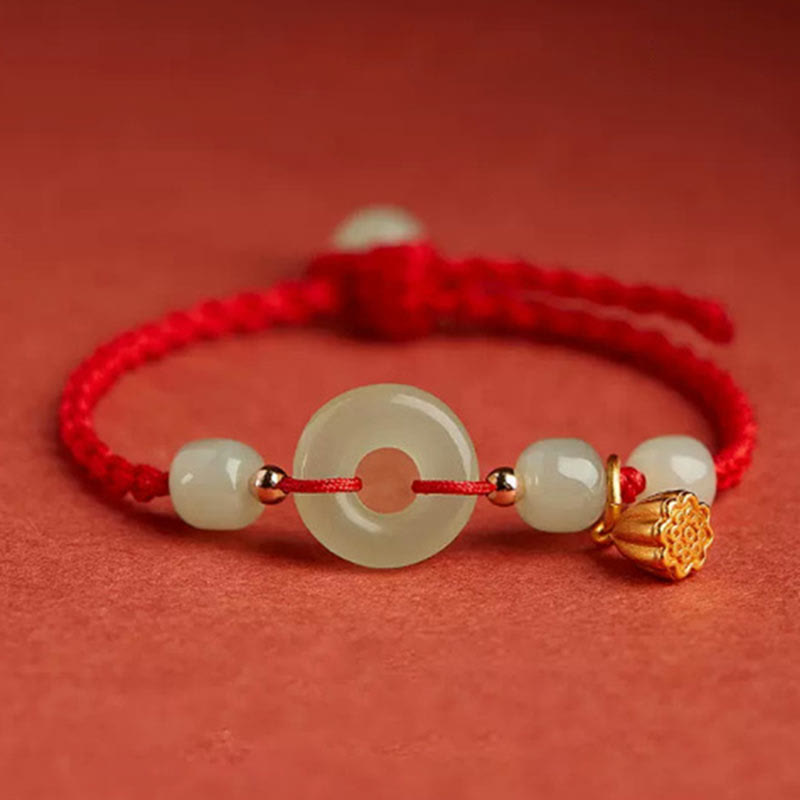 Jade Peace Buckle Lotus Bracelet – flat lay with braided red cord and four jade barrel beads, Balanced