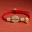 Jade Peace Buckle Lotus Bracelet – flat lay with braided red cord and four jade barrel beads, Balanced