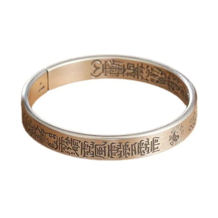 Antique Tai Chi Bracelet – studio white background shot of open silver talisman bangle, Taoist protection