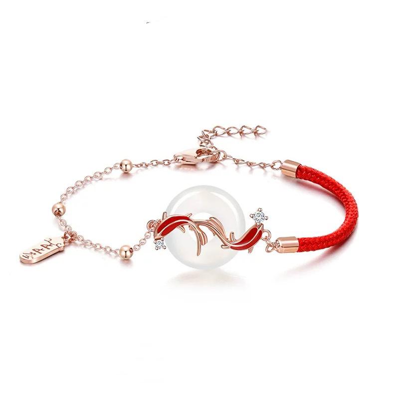 Koi Bracelet – White background flat lay red cord rose gold chain jade button red koi fish, luck protection gift