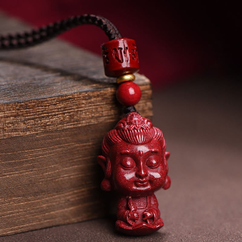 Chinese Zodiac Cinnabar Pendant – Carved red Buddha figure on braided cord against rustic wood, spiritual necklace Hauptbild