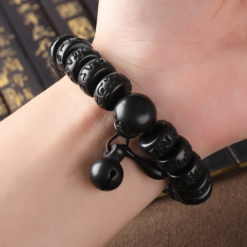 Lightning Strike Wood Bracelet – Black carved bracelet worn on wrist with gourd charm, beaded protection jewelry
