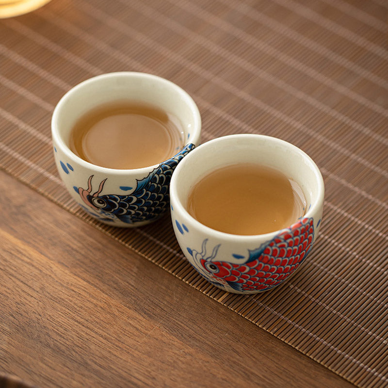 Koi Fish Peony Cup – detail of peony flower brushwork on ceramic, art tea cup