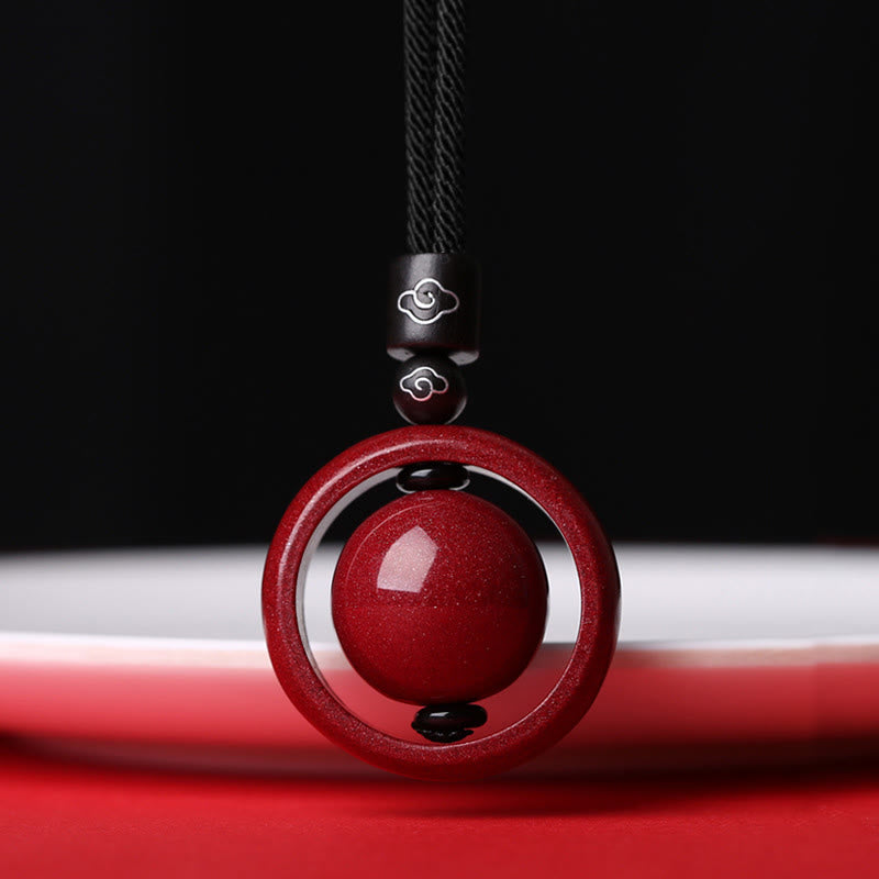 Cinnabar PiXiu Necklace – Red cord cloud-bead version front view on white plate, feng shui protection pendant