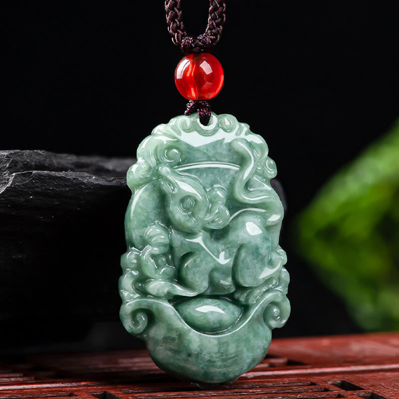 Jade Zodiac Prosperity Necklace – Rabbit zodiac carving on stone and wood, calm presence, serene