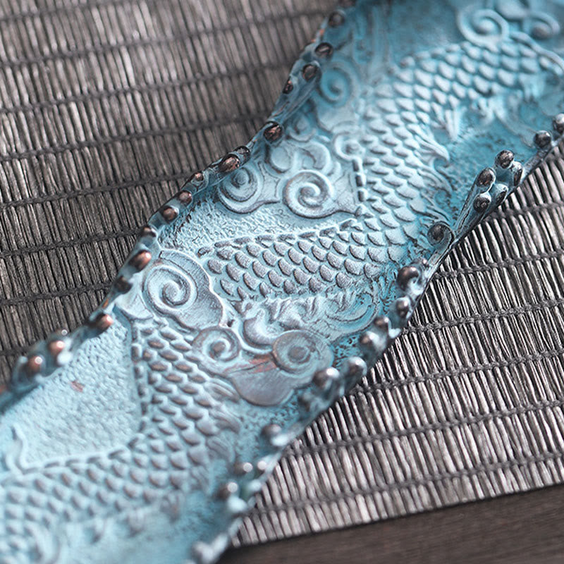 Dragon Alloy Incense Burner - Fish scale textured tray with copper edges on mat, artisanal