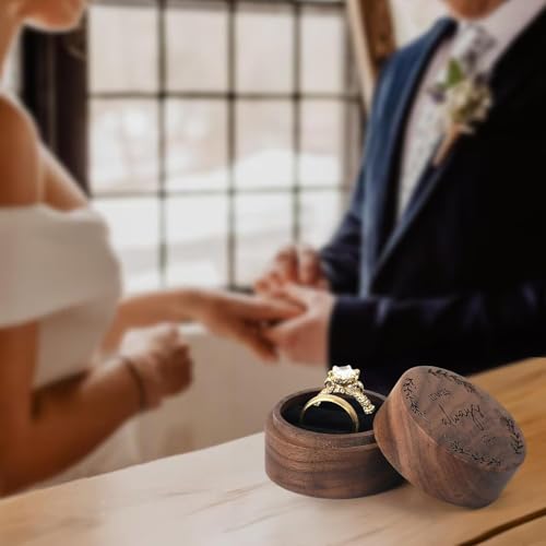 Oval Walnut Wood Ring Box – ring box on wedding table with blurred bride and groom in background, ceremony