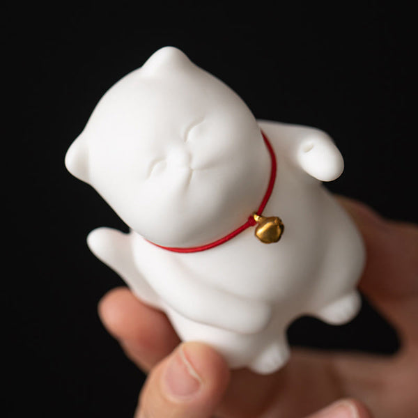 Mini Cute Cat Ceramic Incense Burner – Palm-sized white lucky cat figurine with red collar held in hand, cute desk decor