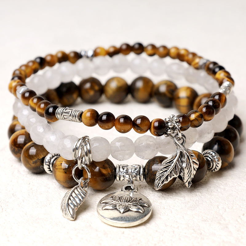Crystal Lotus Bracelet – warm brown tiger's eye and white quartz stack with silver lotus medallion, boho jewelry