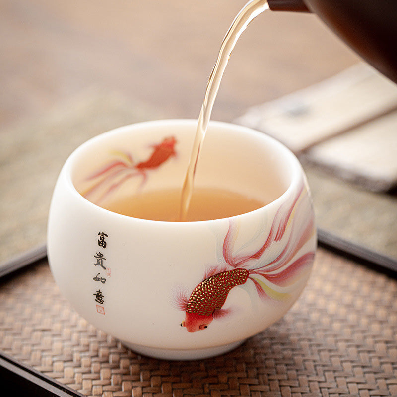 Koi Fish White Ceramic Cup - bottom view showing foot ring and maker mark, artisan