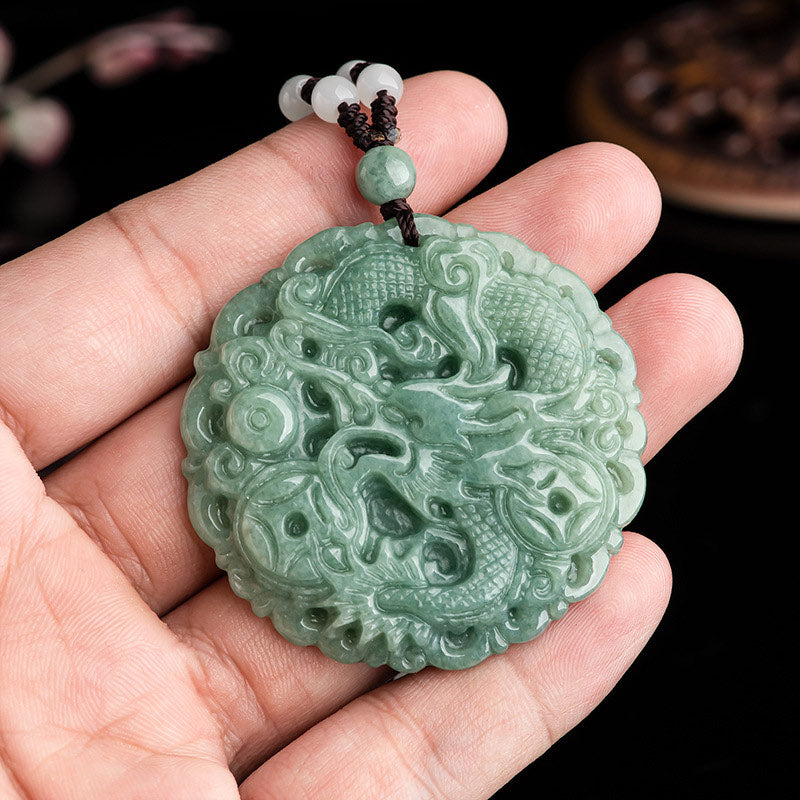 Dragon Jade Fortune Necklace – Jade dragon medallion held in hand, Luck