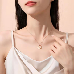 Koi Fish Peace Pendant – worn on woman in white satin top, rose gold chain jade koi necklace, elegant gift