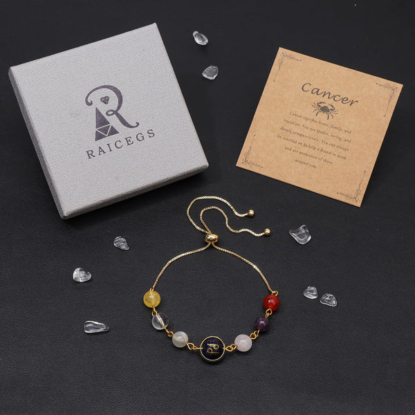 18K Gold Plated Zodiac Stone Bracelet – all 12 zodiac variants displayed together on dark leather surface