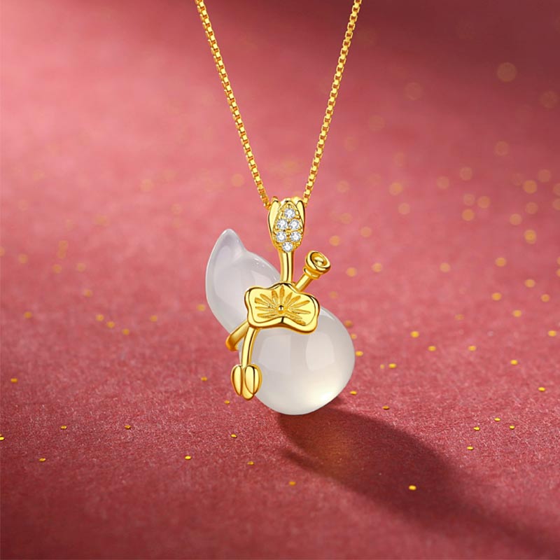Cyan Jade Gourd Pendant Necklace - white jade gourd with gold lotus leaf wrap and crystal bail on rose background