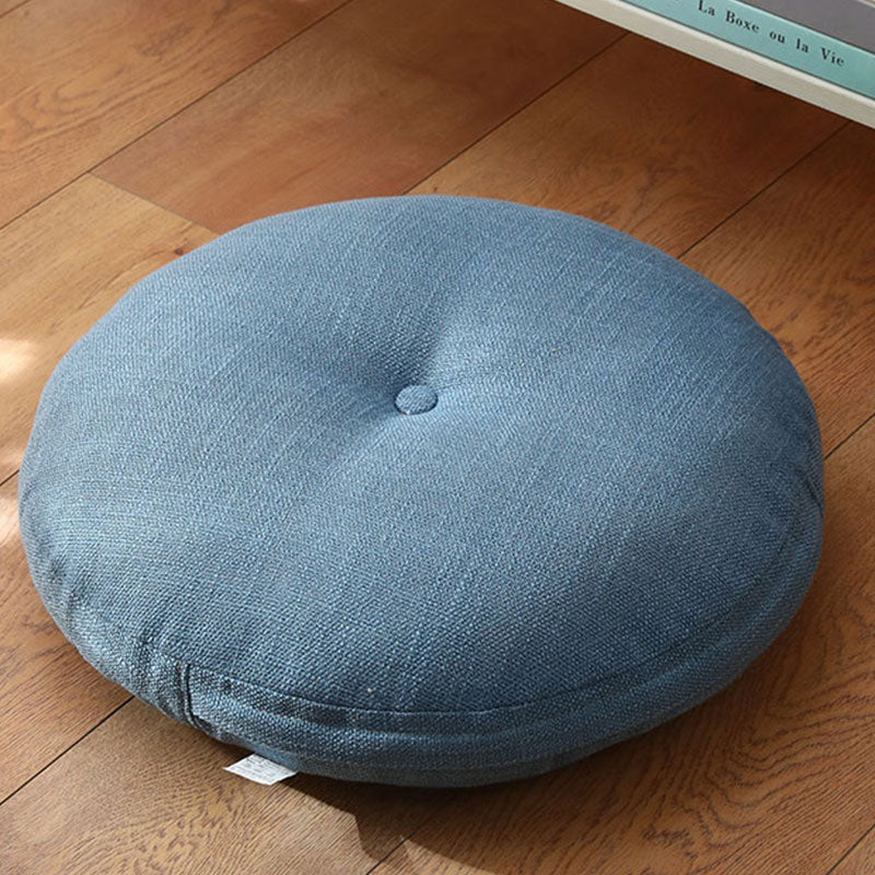 Lotus Linen Meditation Cushion – Slate blue tufted pad on light oak boards, floor seating