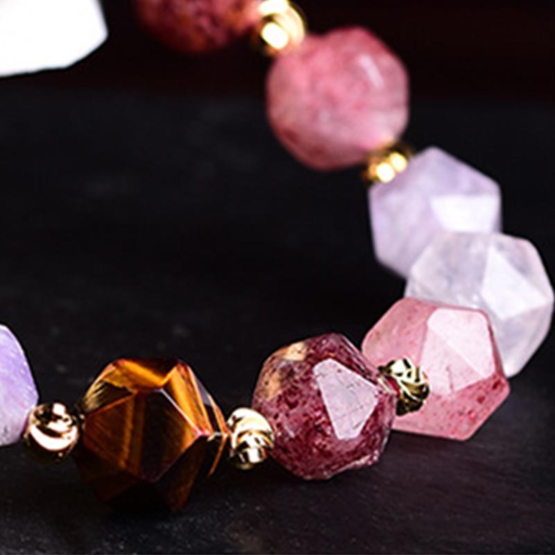 FengShui Amethyst PiXiu Luck Bracelet – faceted tiger eye amethyst pink beads close-up on dark surface, feng shui