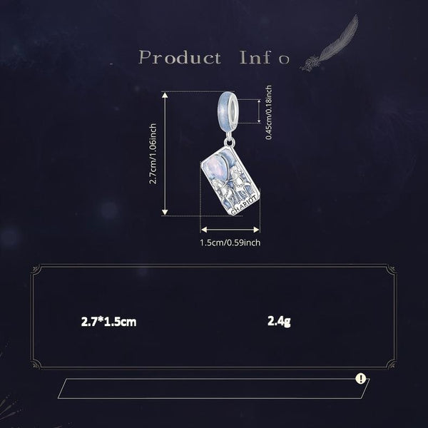 Tarot Silver Charm – The Chariot charm with moonstone cabochon on dark cosmic background