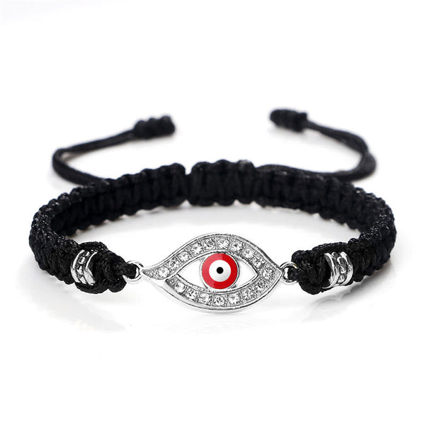 Black cord evil eye bracelet with silver red evil eye crystal pave charm on white bg