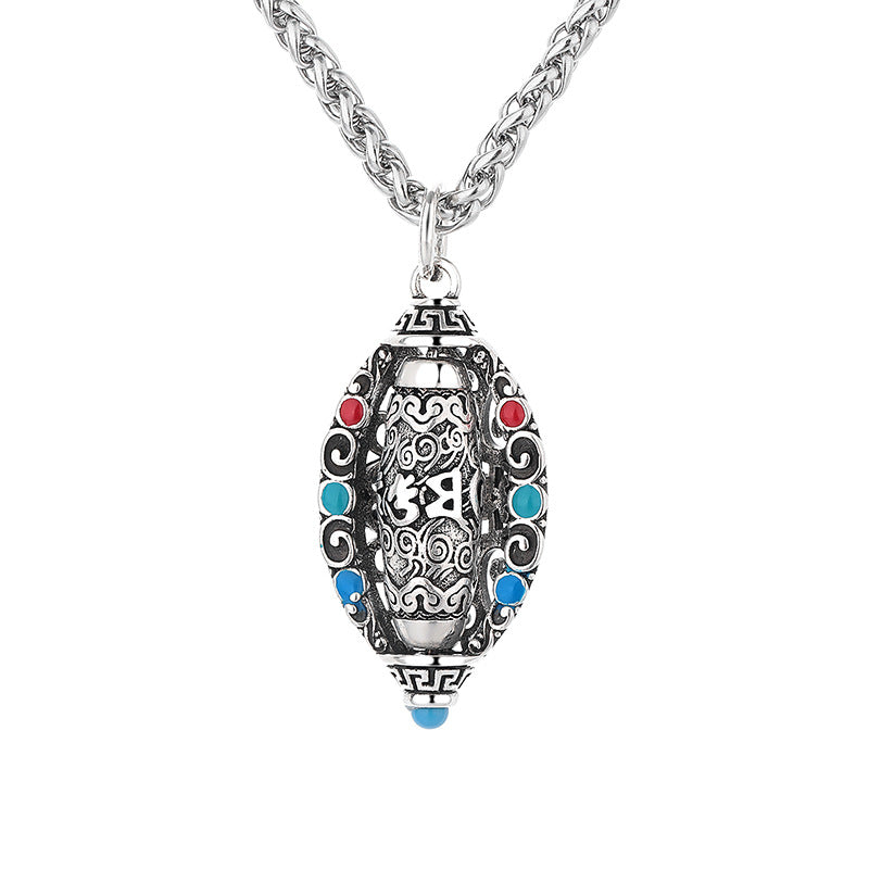 Tibetan Om Mani Padme Hum Pendant Necklace – Front view of silver pendant with mantra engravings and colored cabochon stones