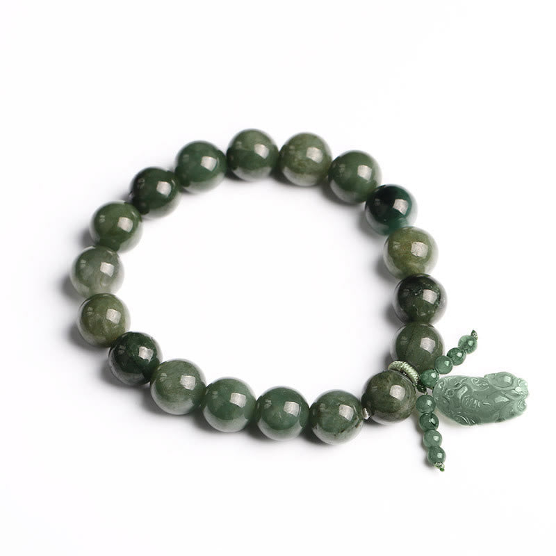 Tibetan Jade PiXiu Prosperity Bracelet – Isolated green jade bracelet with PiXiu charm on white, luck gift