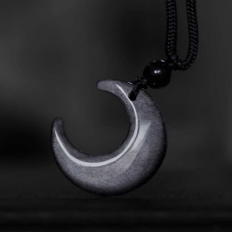 Silver Sheen Obsidian Yin Yang Pendant - Worn on model with blue patina, spiritual necklace