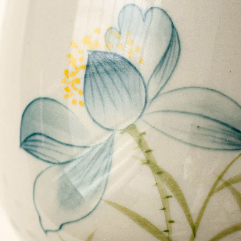 Hand Painted Lotus Tea Cup – close-up of blue lotus with veining detail, watercolor wash technique, artisan brushwork