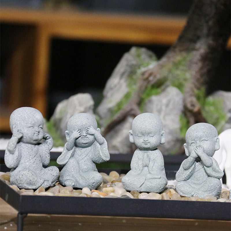 Meditation Monk Statue - Four wise baby monks in hear no evil see no evil poses on stones