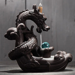 Dragon Incense Burner - Side view brown ceramic dragon smoke on stone, Zen