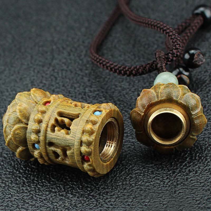 Om Mani Padme Hum Necklace – Wooden prayer wheel locket opened showing brass screw mechanism, turquoise coral inlays