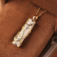 Jade Dragon Phoenix Copper Pendant – Gold dragon coiled around white jade pillar on cable chain, luxurious