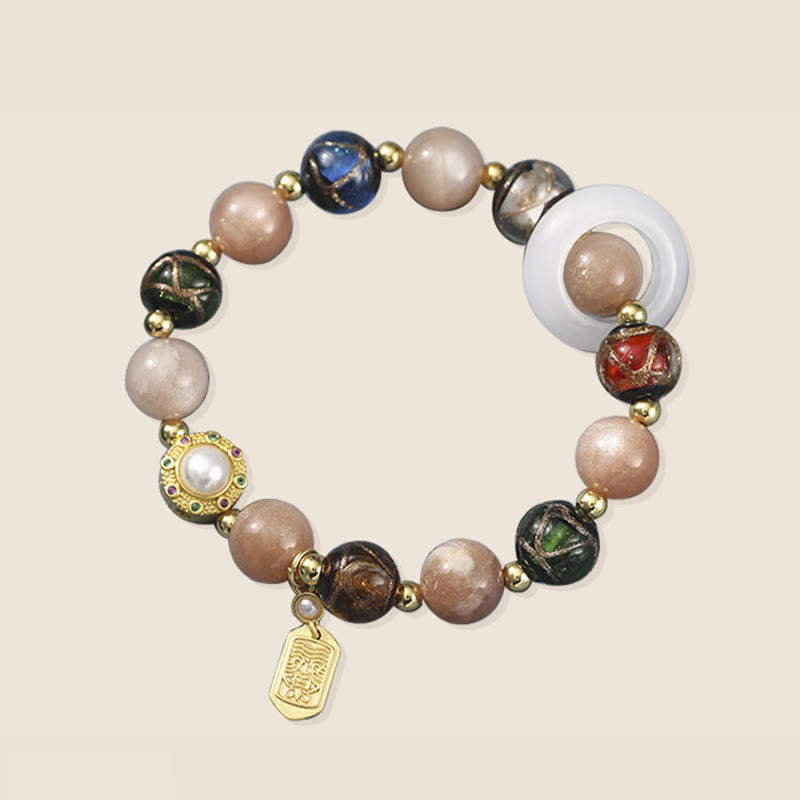 Liuli Glass Prayer Wheel Bracelet – Full circle flat lay on cream background, complete bead layout