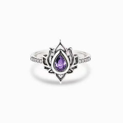 Lotus Zircon Ring – silver lotus design with purple pear stone, zircon protection