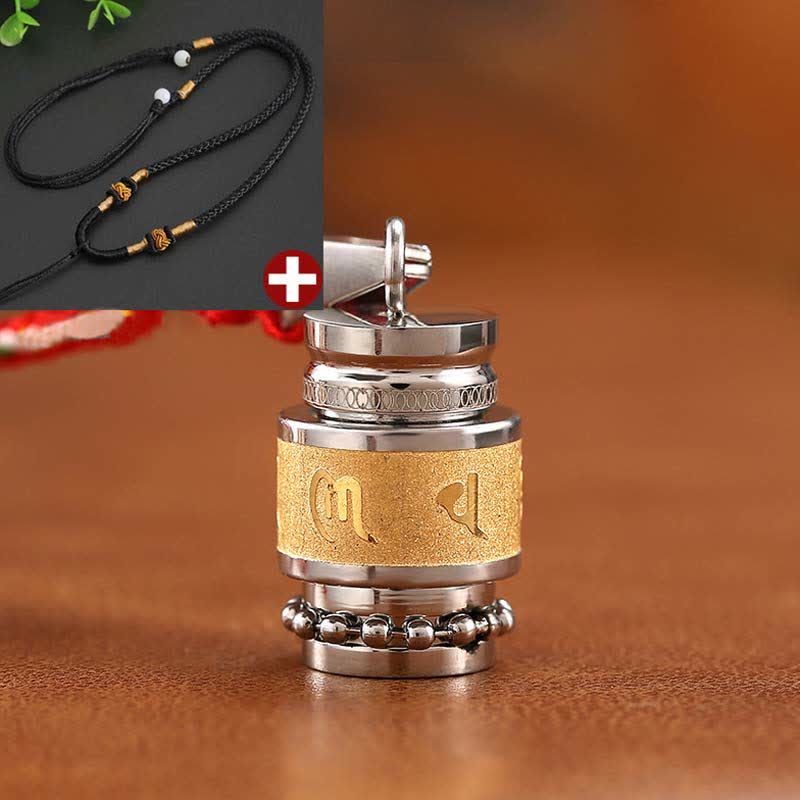 Om Mani Padme Hum Amulet – Prayer wheel with black cord, gold and white bead accents