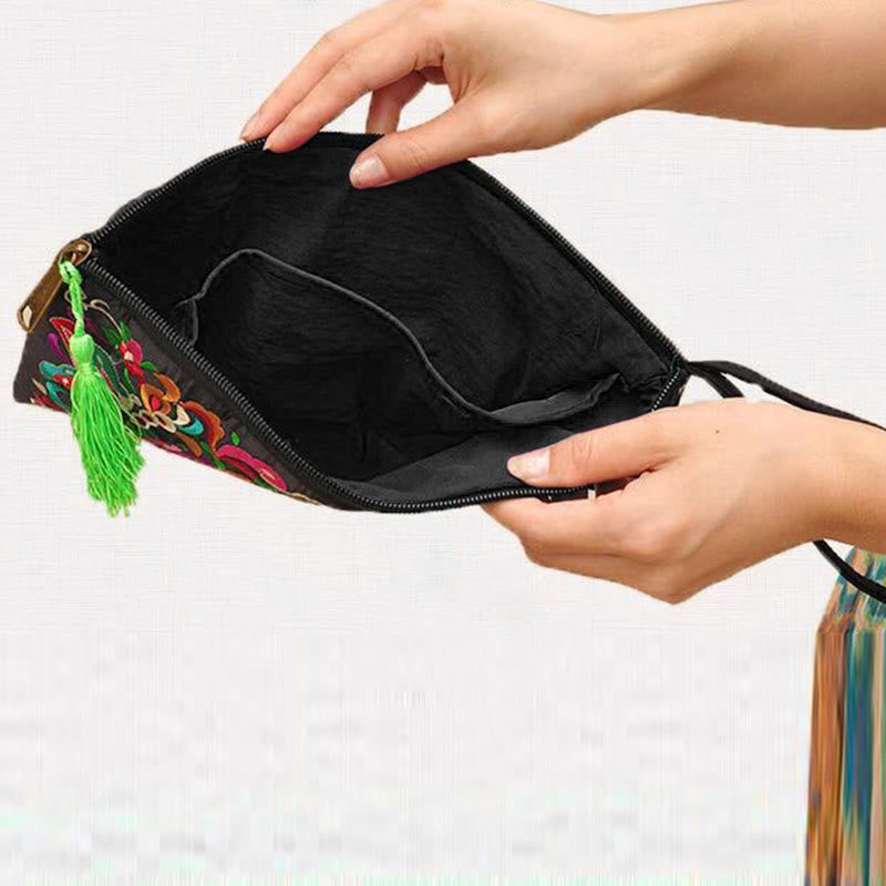 Dragon Butterfly Embroidery Wallet - Held open showing black interior, green tassel, Practical