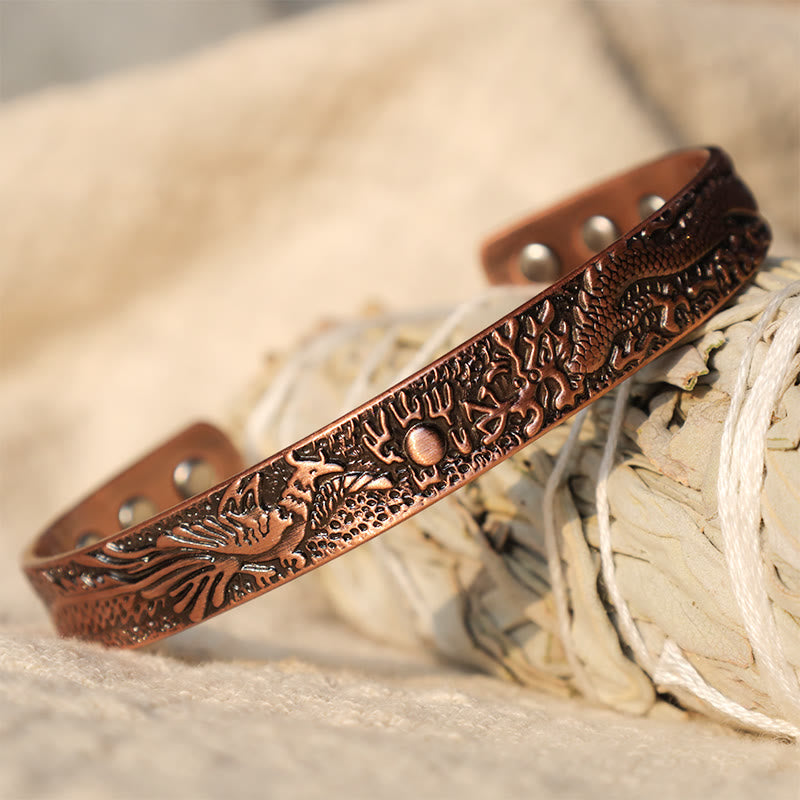 Dragon Phoenix Copper Cuff Bracelet – Dragon and phoenix relief paired on copper, herbal sage setting, Wellness
