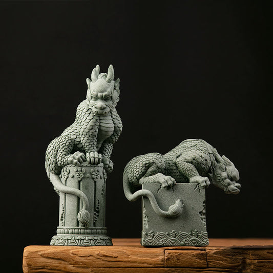 Feng Shui Dragon Sandstone Statue dual qilin pair on wood surface, black backdrop, fierce, guardian