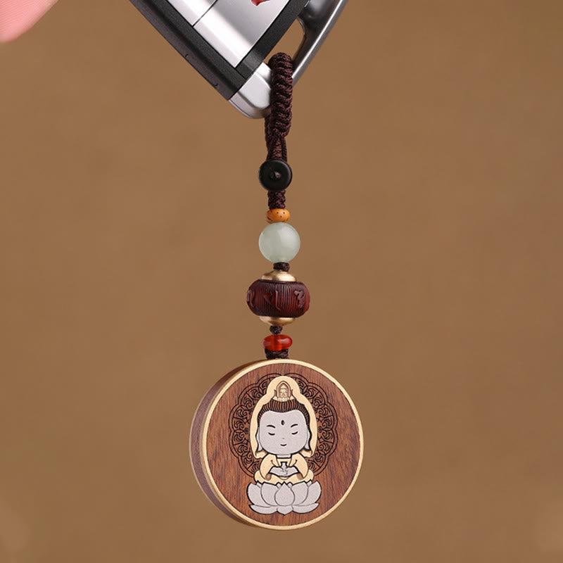 Ebony Avalokitesvara Keychain – on weathered wood with copper bowl, rustic zen accessory flat lay