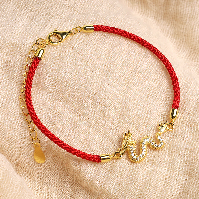 925 Silver Dragon Bracelet - Dragon charm on red cord with extender on beige fabric, spiritual gift