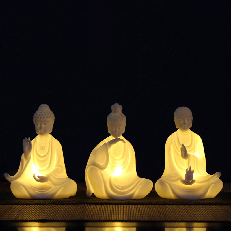 Ceramic LED Bodhisattva Decoration – three glowing Buddhas, warm LED, dark, compassion set