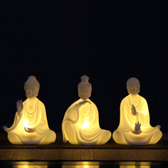 Ceramic LED Bodhisattva Decoration – three glowing Buddhas, warm LED, dark, compassion set