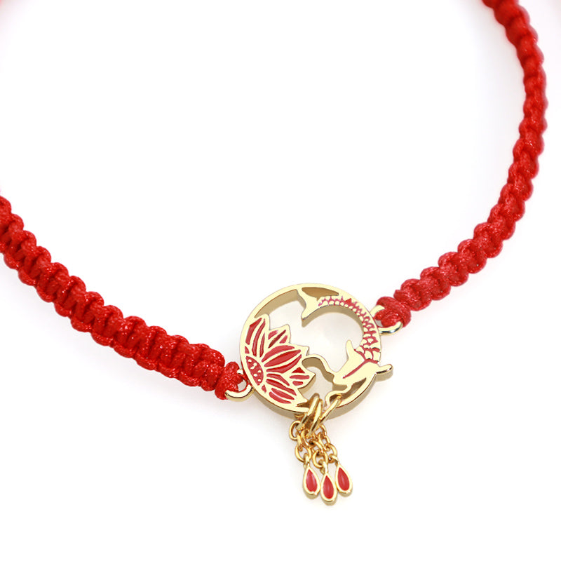 Tibetan Red String Koi Fish Bracelet – gold koi lotus medallion with three teardrop dangles on white, adjustable cord