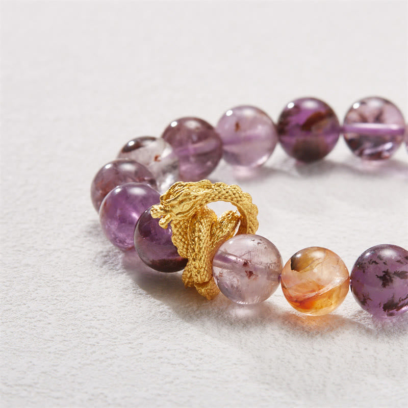 Purple Phantom Quartz Dragon Bracelet – Macro detail of translucent purple beads with amber accent, harmonious