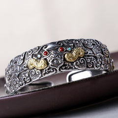 PiXiu Engraved Blessing Bracelet Bangle – silver engraved blessing bangle on dark leather surface, Feng Shui cuff
