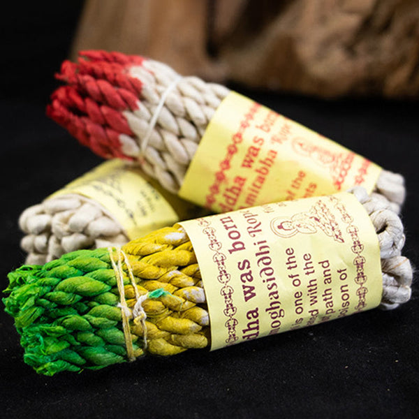 Nepal Rope Incense - overlapping green red and cream bundles, calming