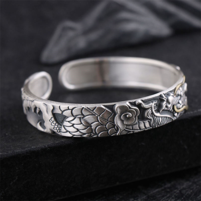 Dragon Scale Sterling Silver Cuff – Intricate scale and cloud engraving along oxidized silver band, Luck